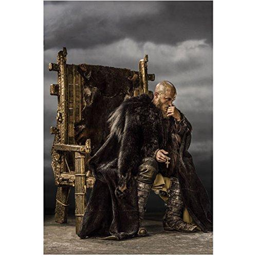 Travis Fimmel as Ragnar Lothbrok Seated on Throne Holding Cross 8 x 10 Photo