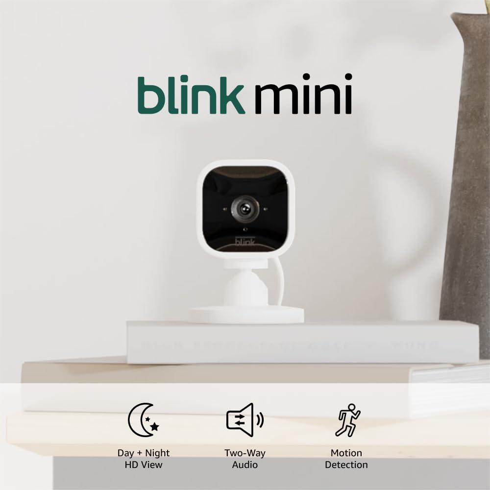 Blink Mini - Compact indoor plug-in smart security camera, 1080p HD video, night vision, motion detection, two-way audio, easy set up, Works with Alexa – 2 cameras (White)